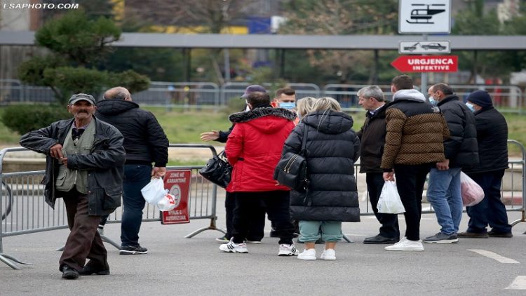 With bags in hand outside the security perimeter, this is what the relatives of the Infectious Diseases patients are waiting for