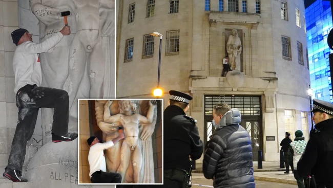 Man with a hammer climbs on the BBC facade to break the statue of the pedophile sculptor (photos)