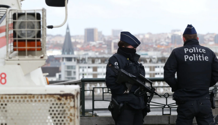 Belgium arrests 13 people for terrorism