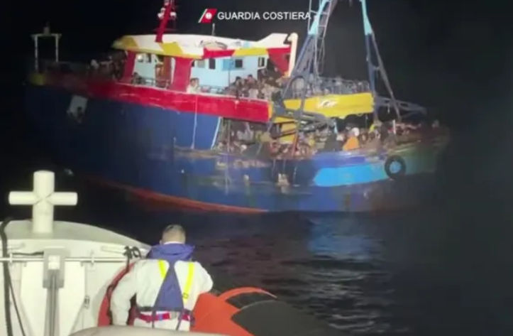 Migrant-filled fishing boat rescued by Italian coast guard at sea (photos)