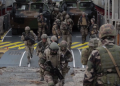 NATO takes control of US attack group, shows strength to Russia