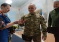 Love triumphs!  The couple get married amid Russian bombing