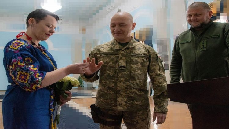 Love triumphs! The couple get married amid Russian bombing