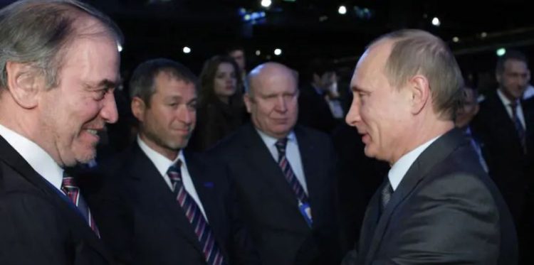 Who are the Russian oligarchs and what is their role?
