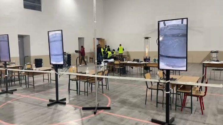 On the mat, ballot boxes are placed in a counting center