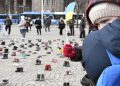 Dozens of children’s shoes in Helsinki Square / Installation dedicated to the most innocent victims of the war