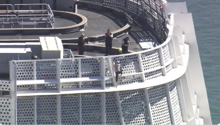 Anti-abortion activist climbs to top of San Francisco tower before being caught by police (video)