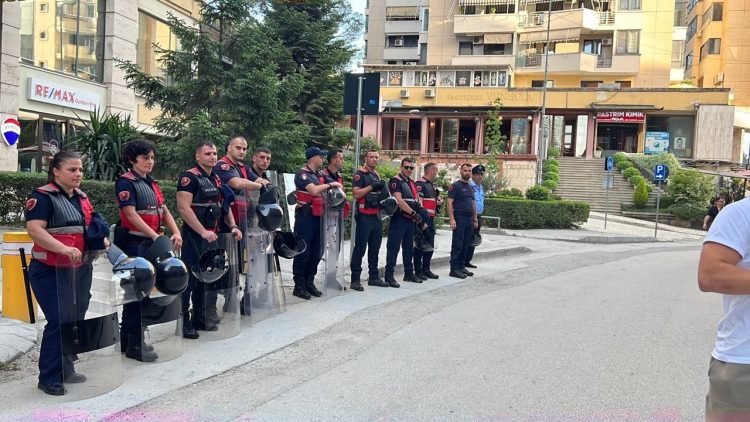 Photo / Former weightlifter Fetije Kasa near the stadium “Air Albania” in charge of maintaining public order and tranquility