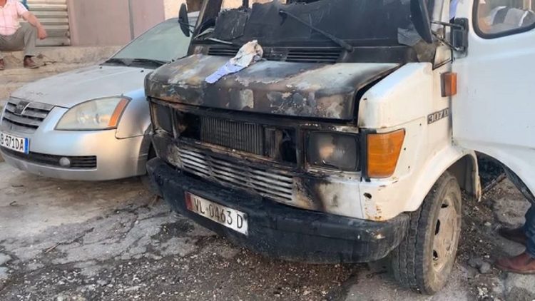 It is covered by the flames of a truck and an apartment in Vlora