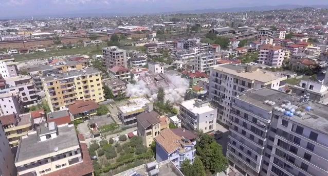 Damaged by the earthquake, a 6-storey building collapses with a controlled explosion on the beach of Durrës