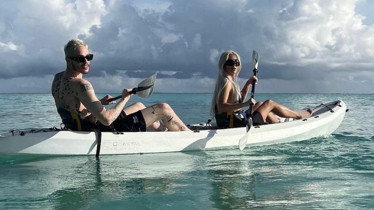 Kisses from heaven!  Kim Kardashian enjoys vacation on private island with boyfriend Pete Davidson