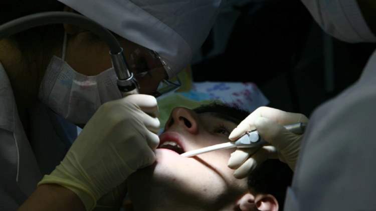 Russians fear the poor quality dental treatments of the Soviet era