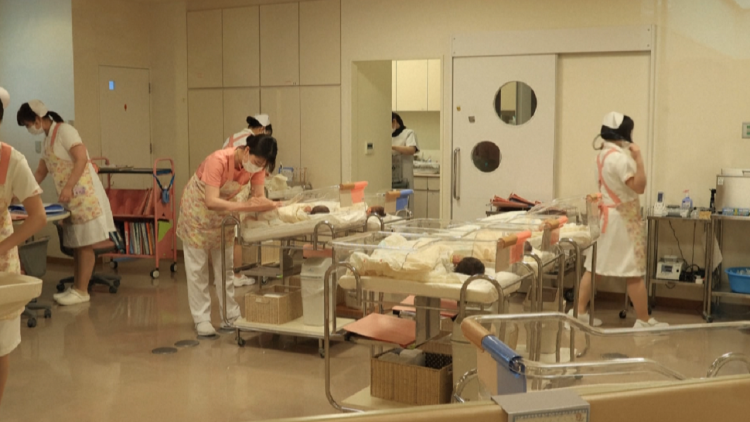 Orphanage hospital in Japan/ Doctors and nurses take care of abandoned children