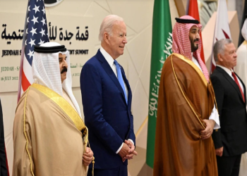 How do activists see President Biden’s visit to the Middle East?