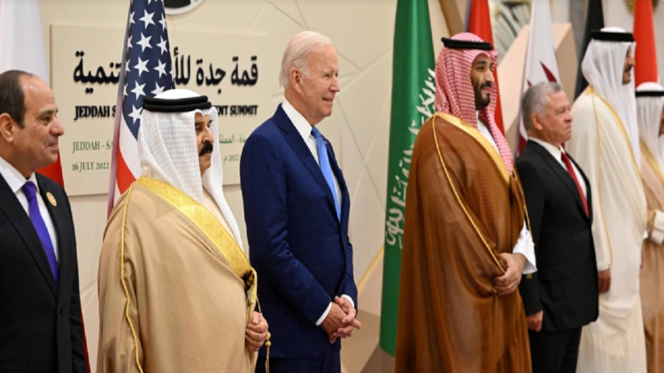 How do activists see President Biden’s visit to the Middle East?
