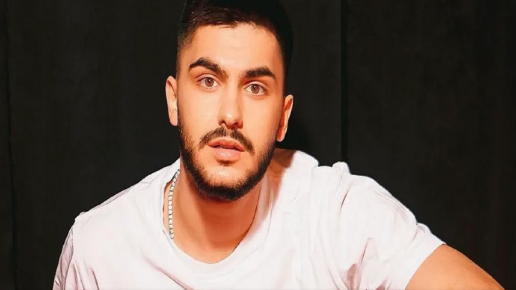 Who is the girl who “holds” Butrint Imeri?