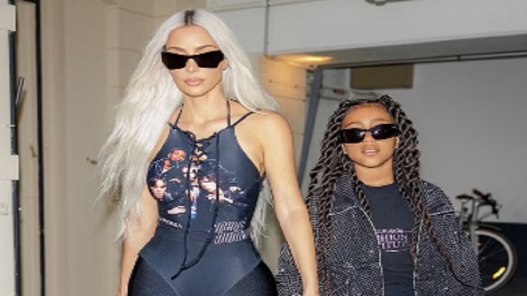 Kim Kardashian strikes again, appears in public with writing on the back of the body (Photo)