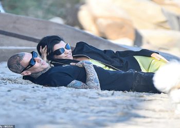 Kourtney Kardashian and Travis Barker “caught up” on the beach where they said “I do” to each other a year ago
