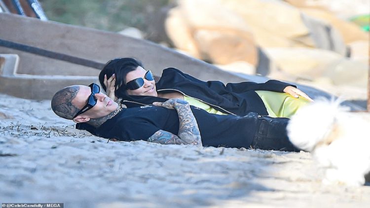 Kourtney Kardashian and Travis Barker “caught up” on the beach where they said “I do” to each other a year ago